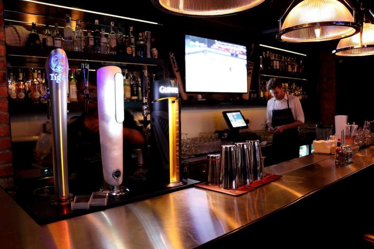 Girls would be thrilled to know that there's a young and good looking English bartender manning the bar
