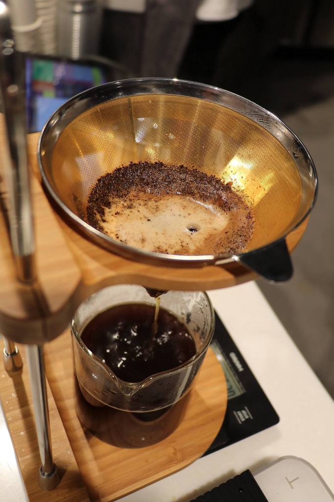Drip coffee using a gold fllter on the top floor