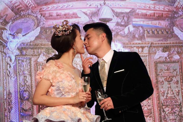 Shot from below the stage against a projected backdrop