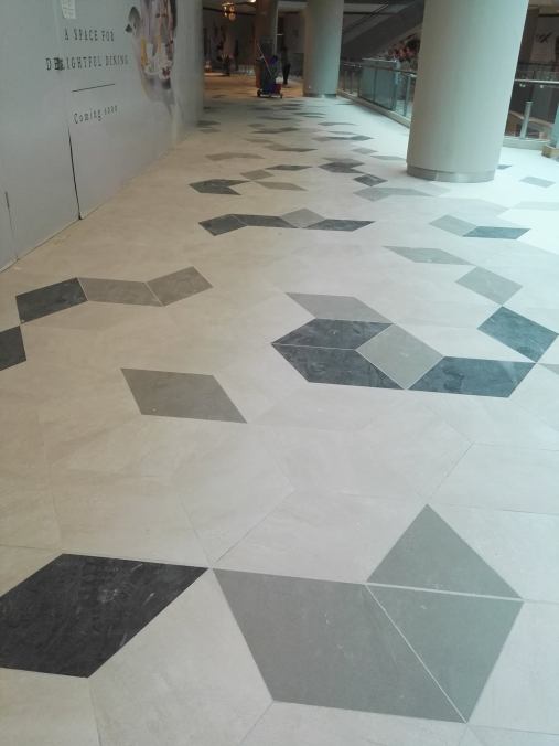 Very dusty floors even though the cleaners were trying their best to clean it but the constant amount of dust makes it an impossible task