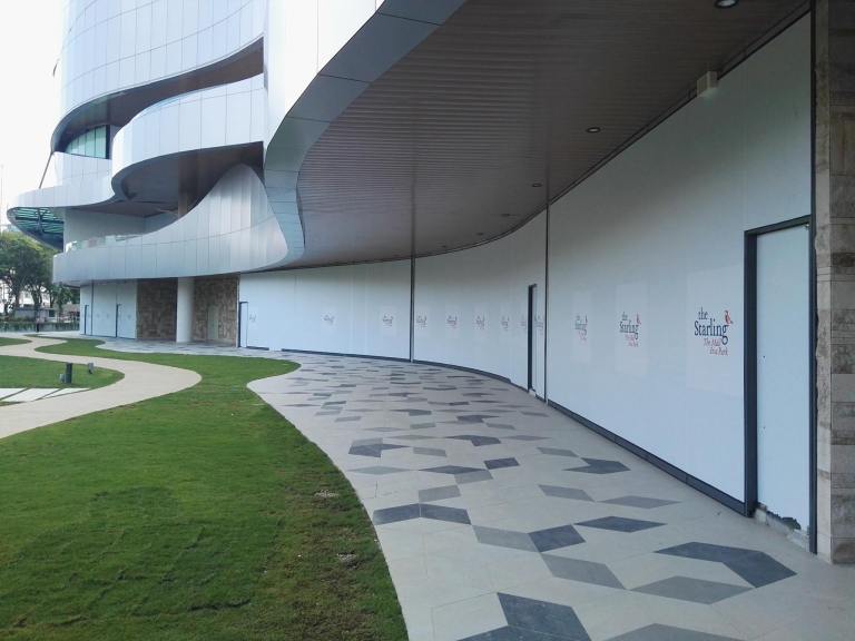 The outside of the mall facing the shoplots across the road