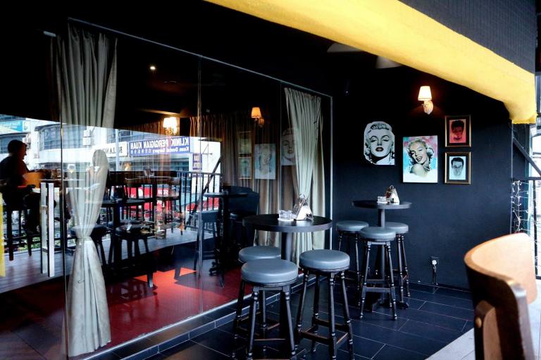 The front of the establishment is an al fresco area overlooking the busy road below. Great for people watching.