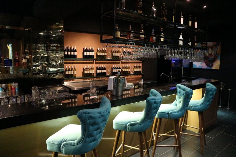 The fully stocked bar which offers everything from beers to liquor and of course wines