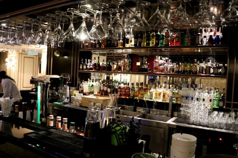 The well stocked bar which serves everything from cocktails to liquor and wines
