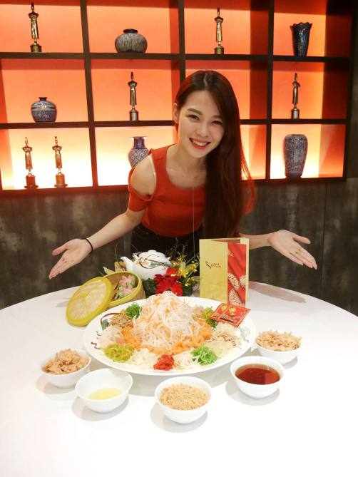 Joyce with the yee sang during the CNY review at Dynasty Chinese Restaurant at Renaissance Kuala Lumpur Hotel