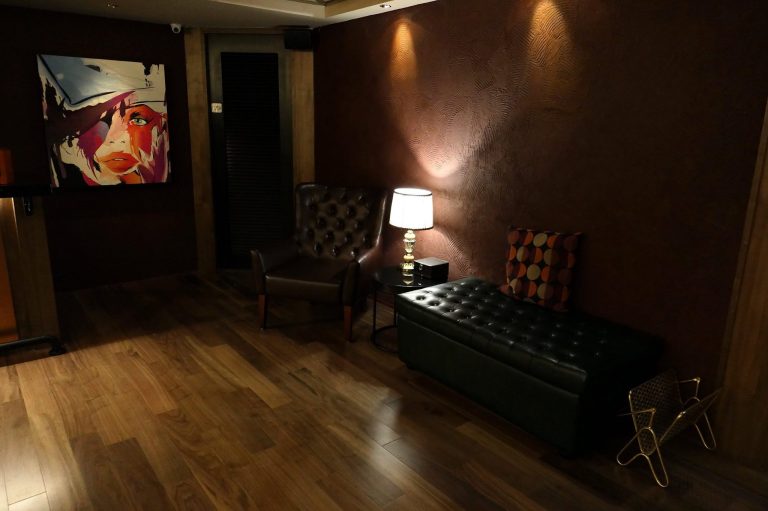 Dark and somewhat mysterious setting befitting a wine lounge