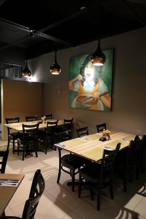 Large paintings line the walls giving the place some character