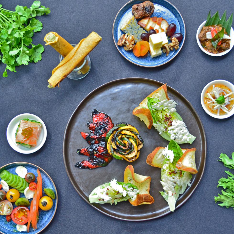 Hickory-Smoked Chicken with Vegetable Ratatouille, Tea Tree-Smoked Norwegian Salmon and Potato Feuille, Artisan Heirloom Tomatoes with Buffalo Mozzarella, Assorted Cheese Platter, Classic Caesar Salad with Condiments, Classic Fillet Stroganoff, Beef Rendang, Fried Seabass with Thai Sauce and Mango Salad