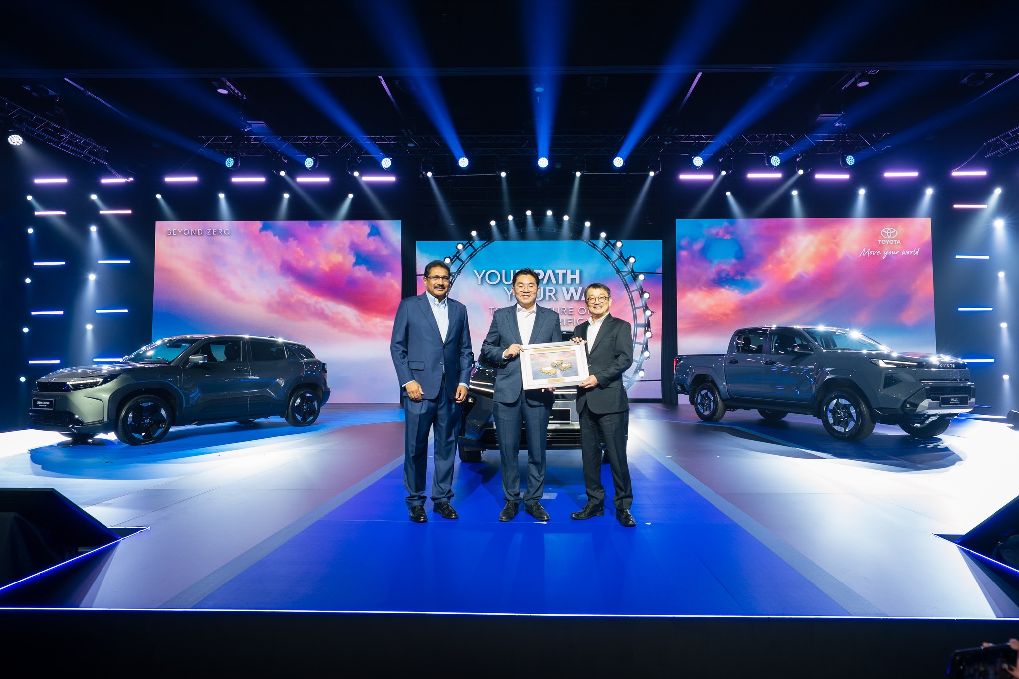 (From Left) Datuk Ravindran K., President UMW Toyota Motor, YB Tuan Sim Tze Tzin, Deputy Minister of Investment, Trade and Industry (MITI), Mr. Takashi Obata, Deputy Chairman of UMW Toyota Motor
