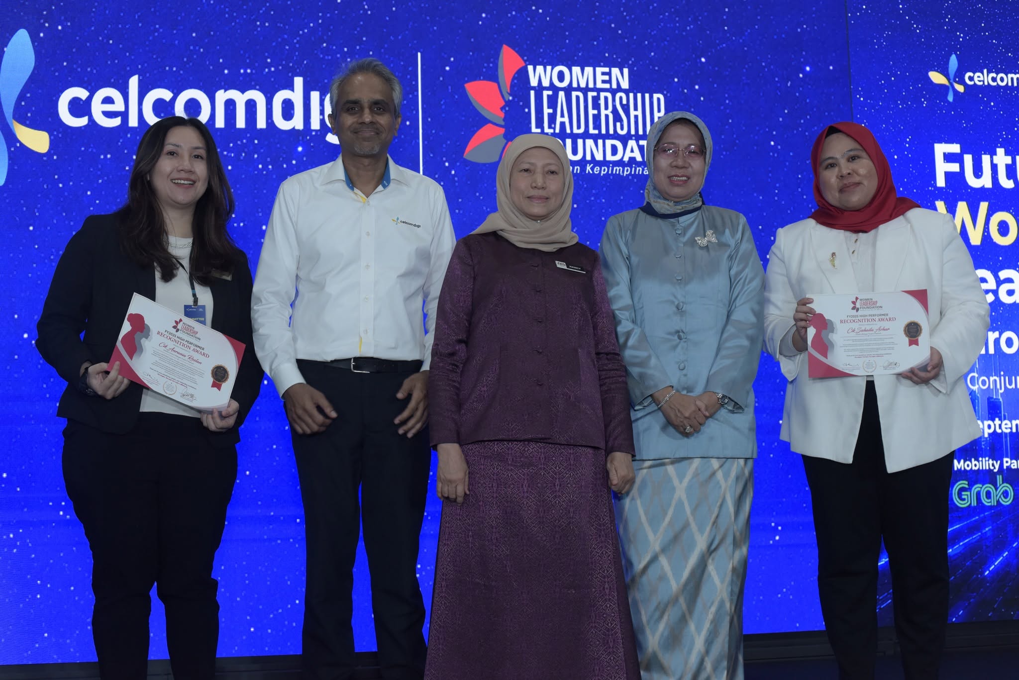 [From left to right] Anrania Roslan, Assistant General Manager, Women Leadership Foundation; Albern Murty, Chief Executive Officer, CelcomDigi; YB Dato’ Sri Hajah Nancy Shukri, Minister of Women, Family and Community